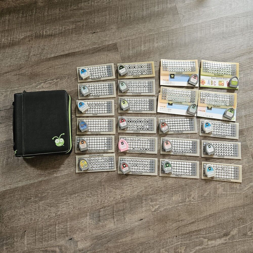 Cricut Cartridges Lot of 23 With Storage Binder